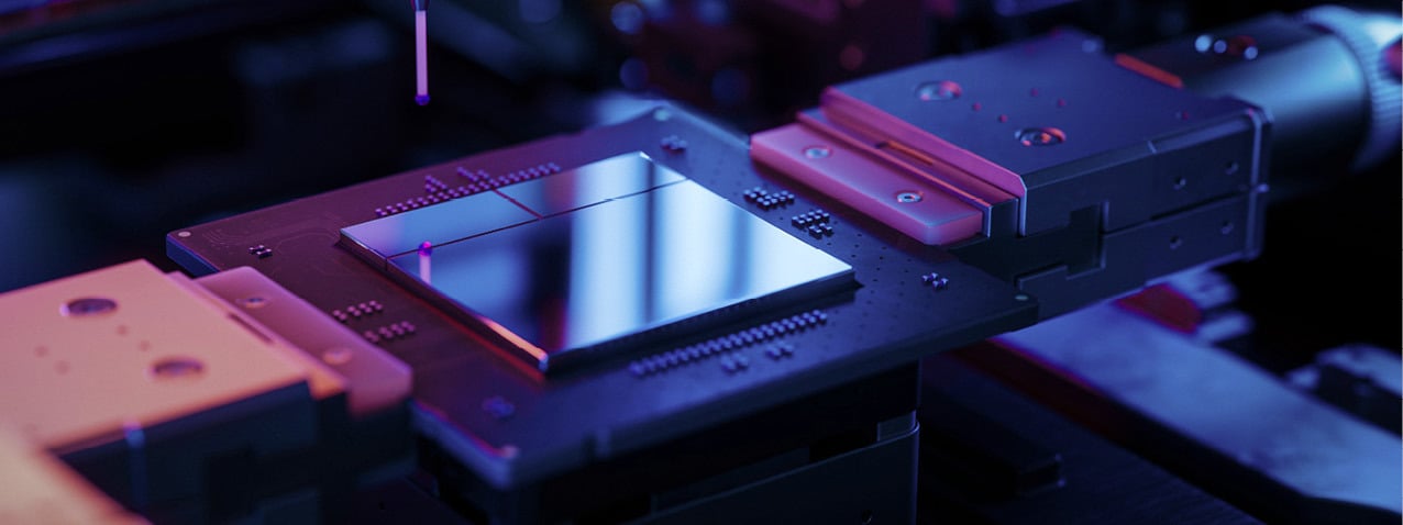 Close-up of semiconductor manufacturing equipment processing a silicon wafer.