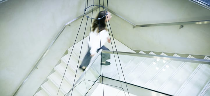 A woman is walking down a staircase in a building.
AI generated content