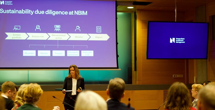 Presenter speaking at an NGO seminar in Oslo, with a slide titled “Sustainability due diligence at NBIM” displayed on screen.